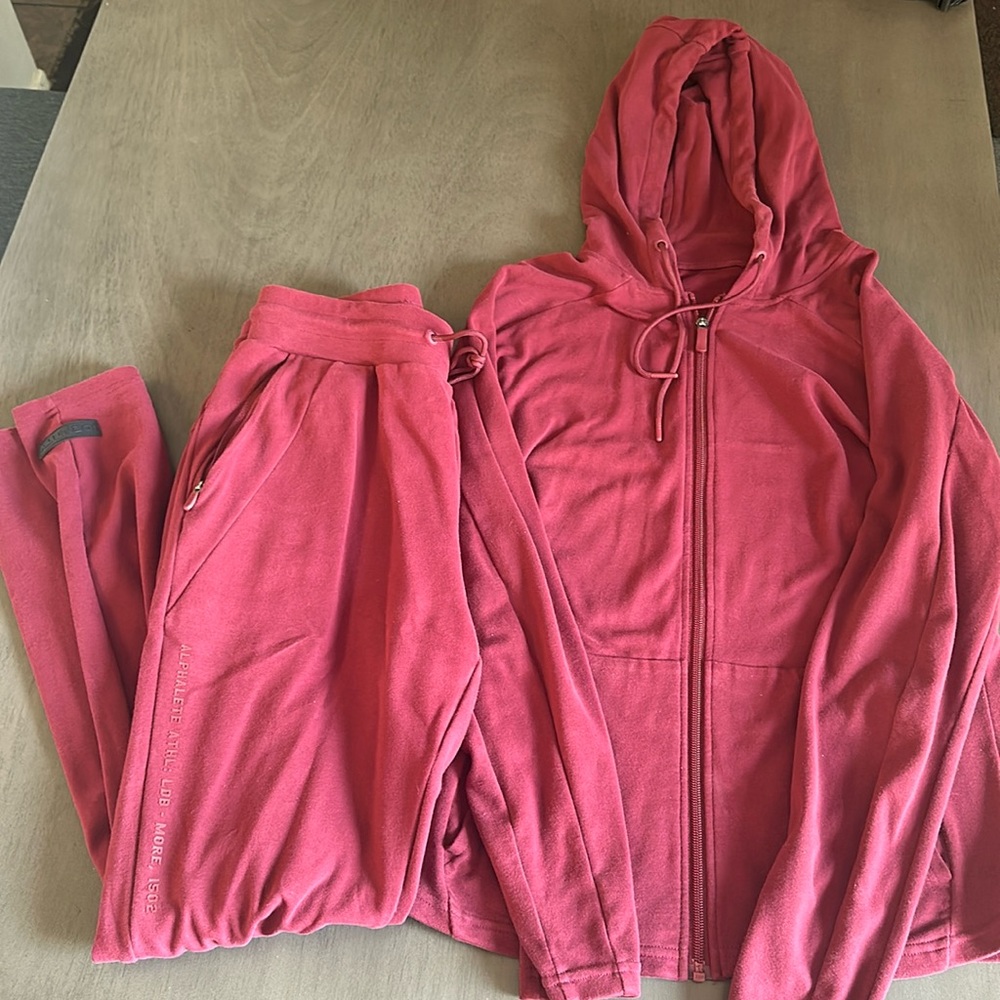 Alphalete color maroon sweater sweat pants set size medium great condition.